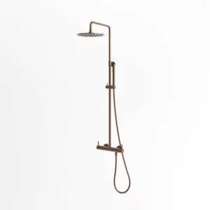 SINED Levante Wall Shower In 316l Stainless Steel. Rose Gold. For Exterior and Interior use. Hot and Cold Water Inlet. Thermostatic mixer for Overhead and Hand Shower. Wall installation for indoor and outdoor use. 25 cm overhead shower. PVD finish.