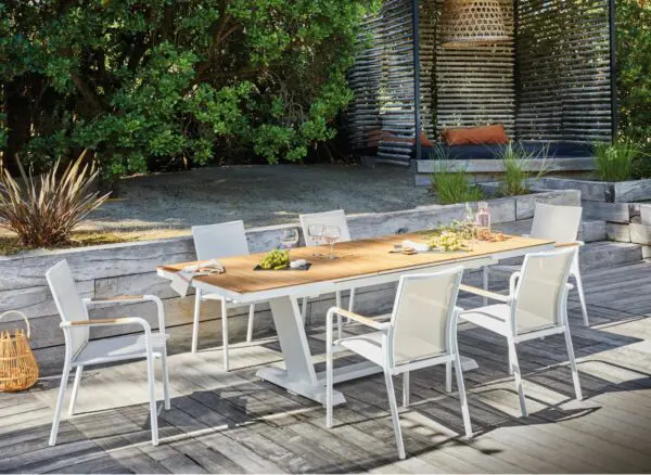 The elegant and durable sined garden table extends from 180 to 240 cm, featuring a powder-coated aluminum frame and a stunning FSC® teak slatted top, providing a stylish and practical solution for outdoor gatherings with space for 8-10 people. - Image 3
